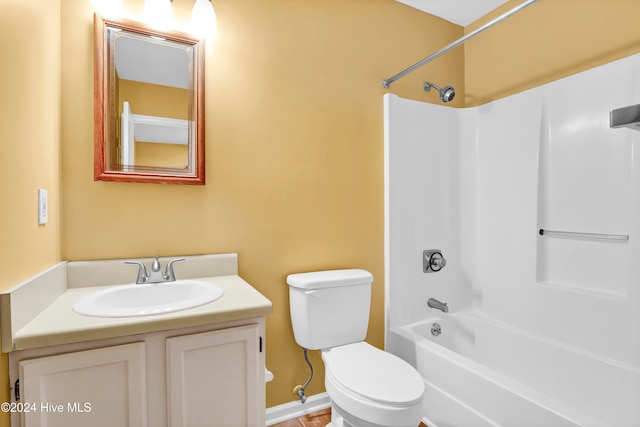 full bathroom with toilet, vanity, and shower / bathtub combination