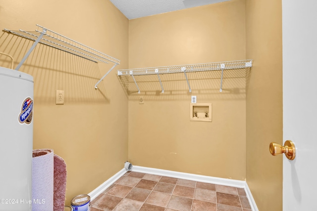 laundry room featuring hookup for a washing machine and tile patterned floors