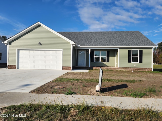 single story home with a garage