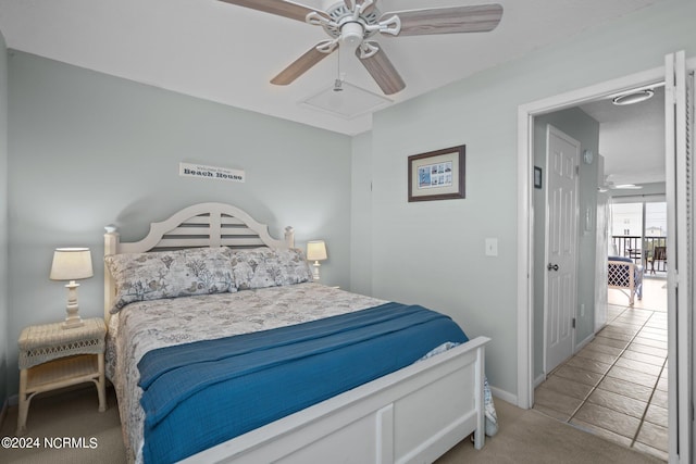 bedroom with ceiling fan and light colored carpet