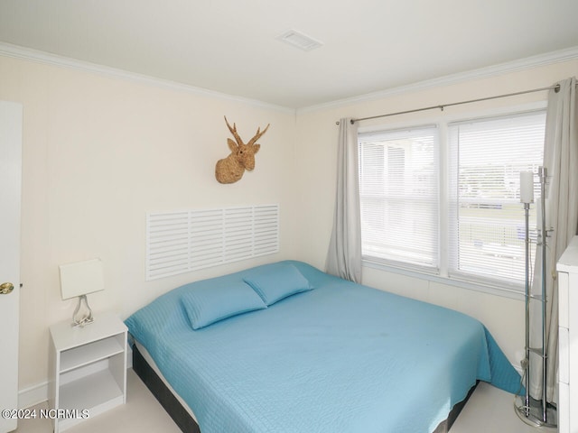 bedroom featuring ornamental molding