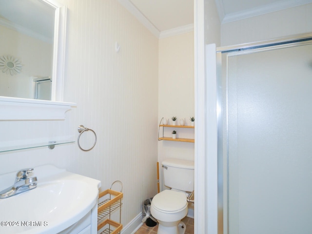 bathroom with a shower with door, toilet, vanity, ornamental molding, and tile patterned flooring