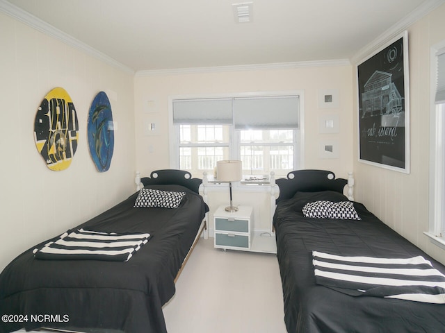 bedroom featuring crown molding