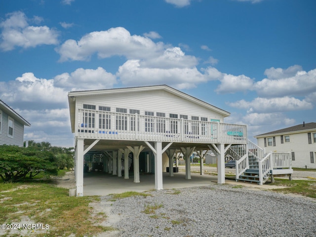 coastal home with a wooden deck