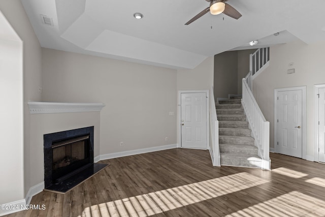 unfurnished living room with hardwood / wood-style floors and ceiling fan