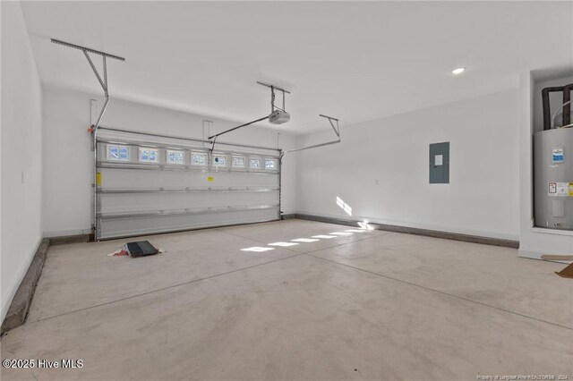 garage featuring electric panel, a garage door opener, and water heater