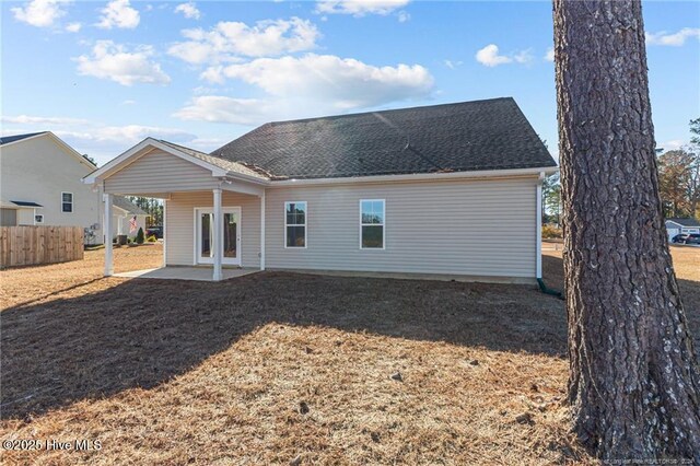 back of house featuring french doors