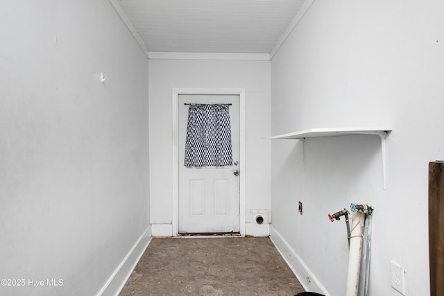 washroom with ornamental molding, washer hookup, laundry area, and baseboards