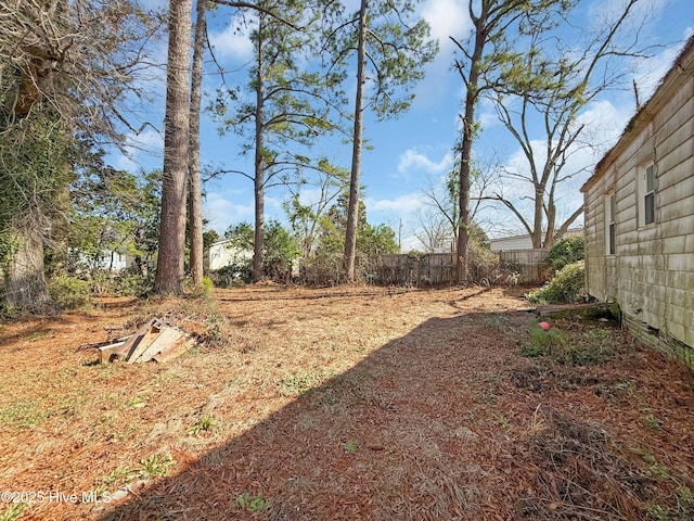 view of yard with fence