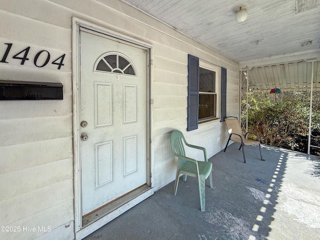 entrance to property with a porch