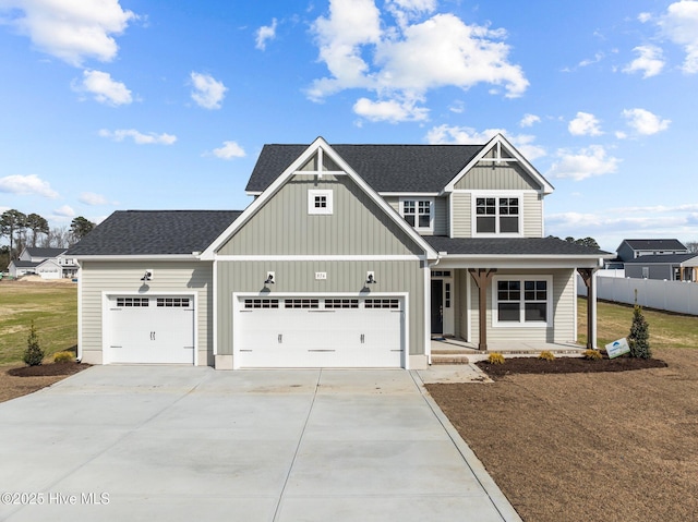 craftsman house with covered porch, fence, concrete driveway, roof with shingles, and board and batten siding