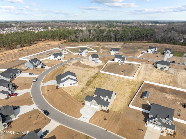 aerial view featuring a view of trees