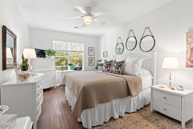 bedroom featuring hardwood / wood-style floors and ceiling fan