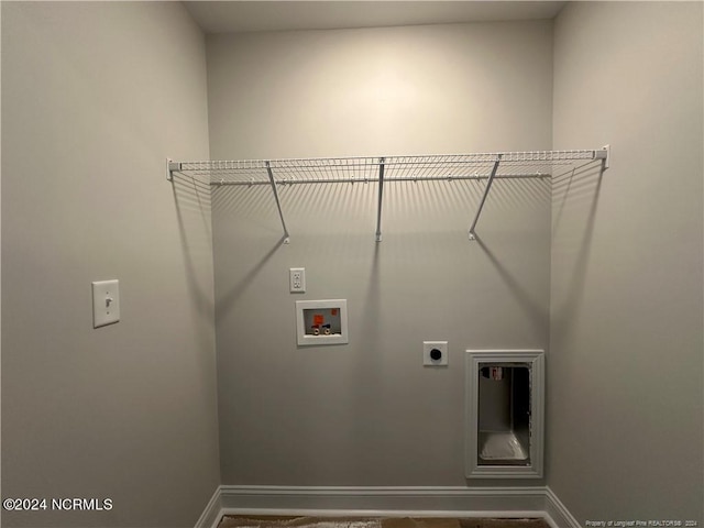 washroom with hookup for a washing machine and electric dryer hookup