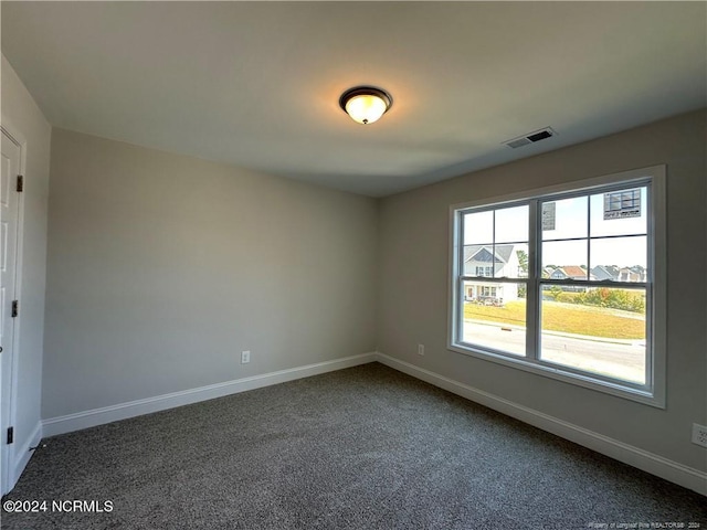 view of carpeted spare room