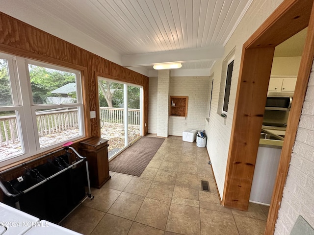 sunroom / solarium with beam ceiling and wood ceiling