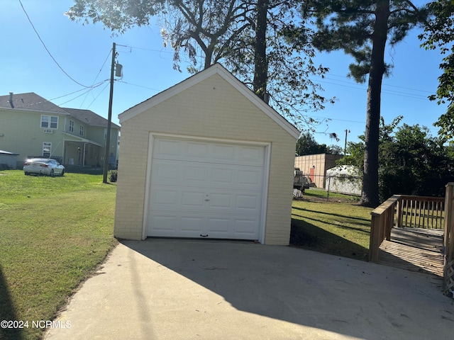 garage with a lawn