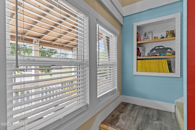 412 Womble St, Oak Island, NC 28465 - entryway with dark wood-style floors and baseboards