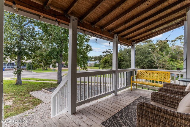 doorway to property with a wooden deck