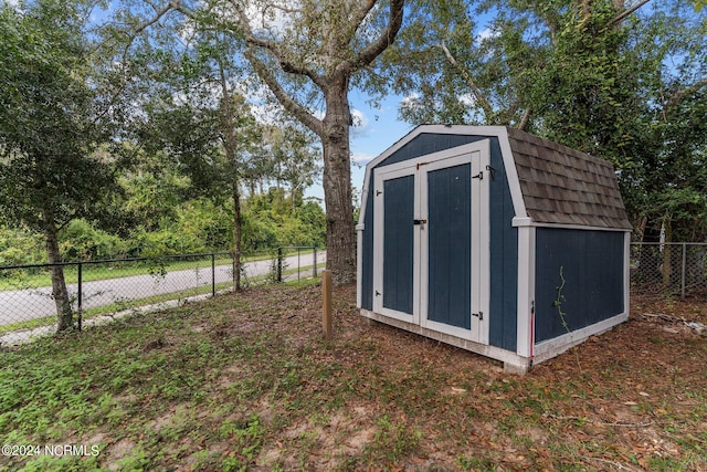 412 Womble St, Oak Island, NC 28465 - view of shed with a fenced backyard