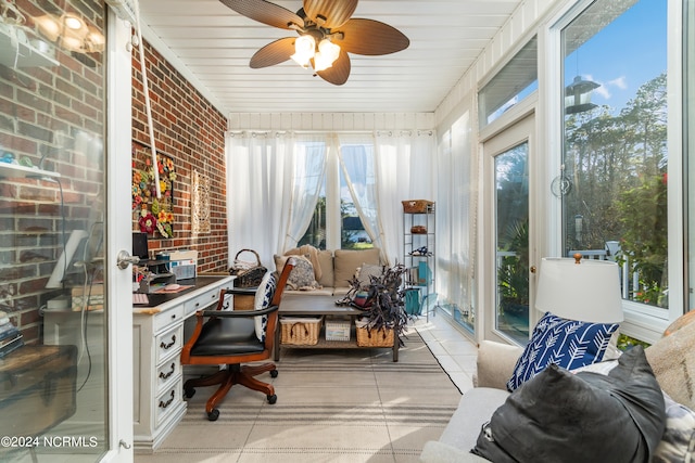 sunroom / solarium with wooden ceiling and ceiling fan