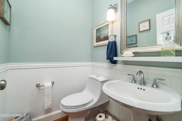 bathroom with sink and toilet