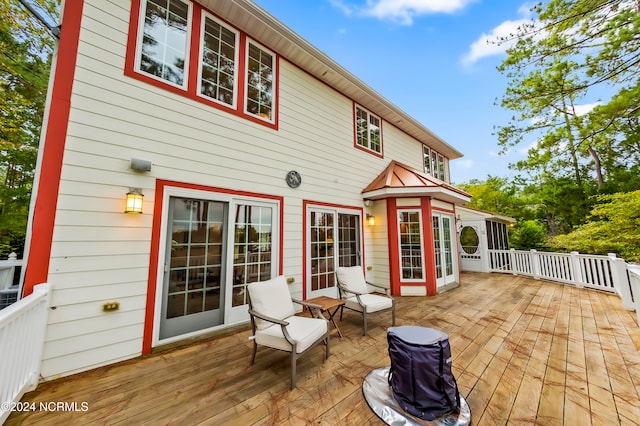 rear view of house with a deck