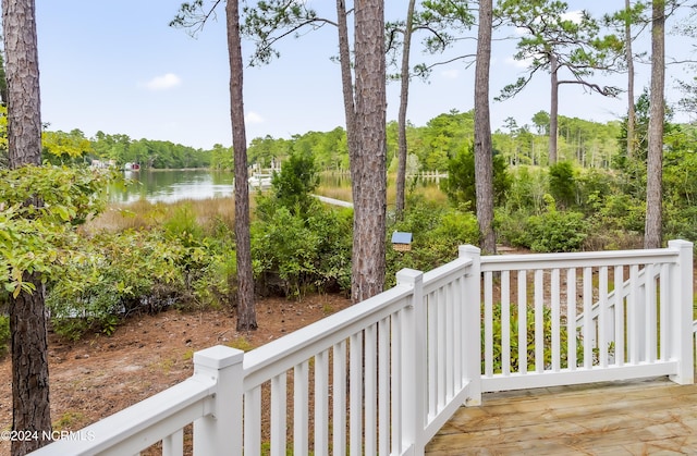 wooden deck with a water view