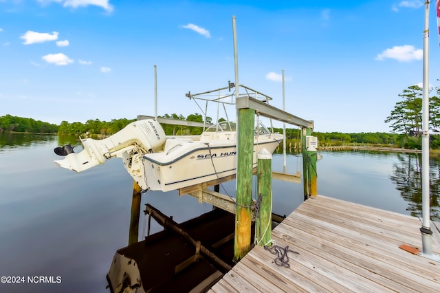 view of dock with a water view