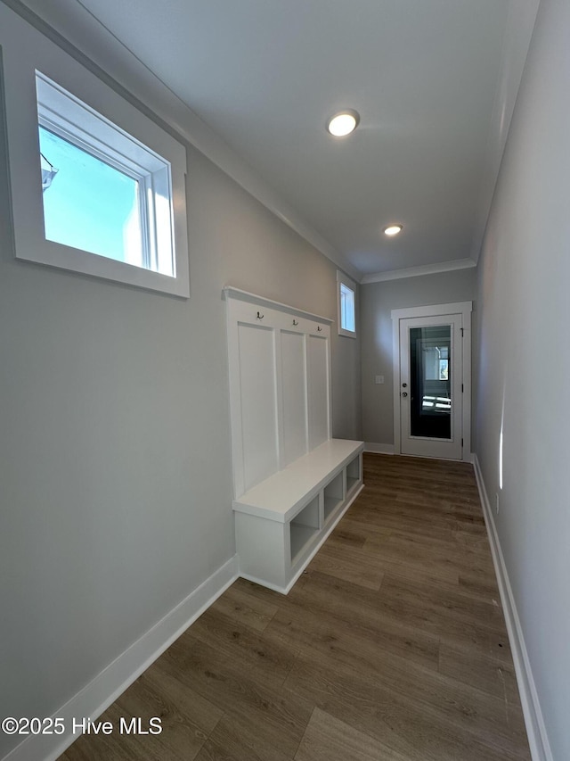 mudroom featuring crown molding, dark wood-style flooring, recessed lighting, and baseboards