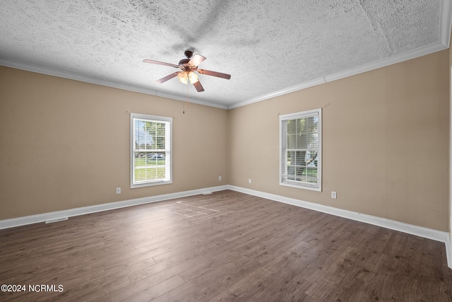 unfurnished room with ceiling fan, a textured ceiling, dark hardwood / wood-style floors, and crown molding