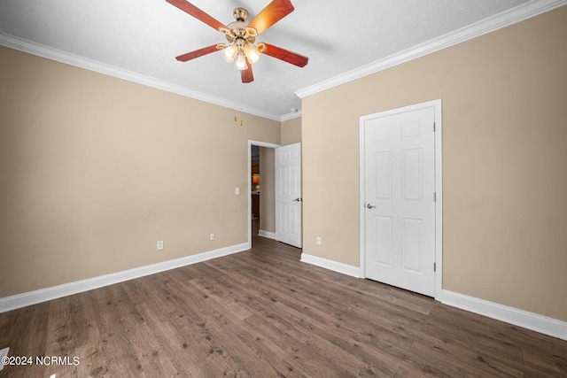 unfurnished bedroom with dark wood-type flooring, crown molding, and ceiling fan