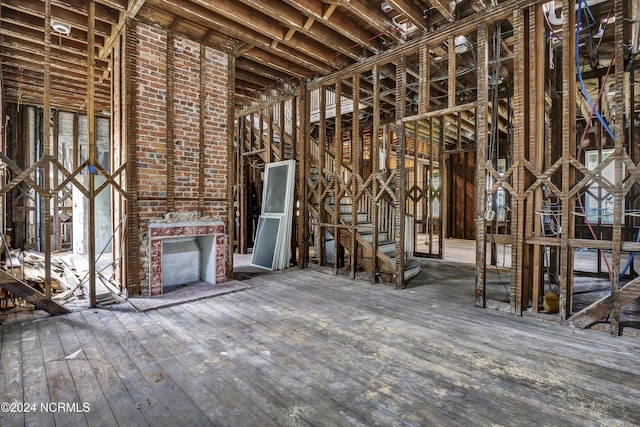 miscellaneous room featuring wood-type flooring