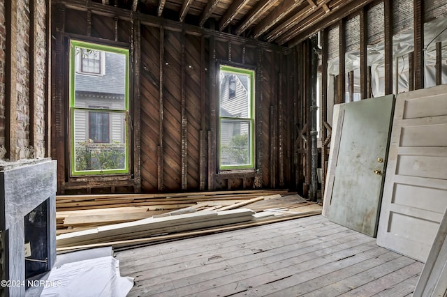 miscellaneous room featuring wood-type flooring
