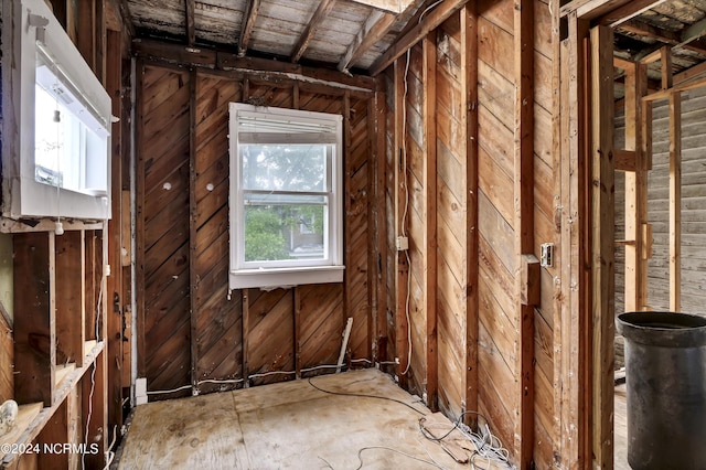 miscellaneous room with wooden walls
