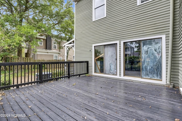 wooden deck featuring fence