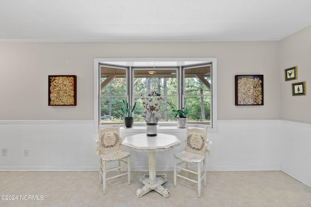 dining area featuring light tile patterned flooring