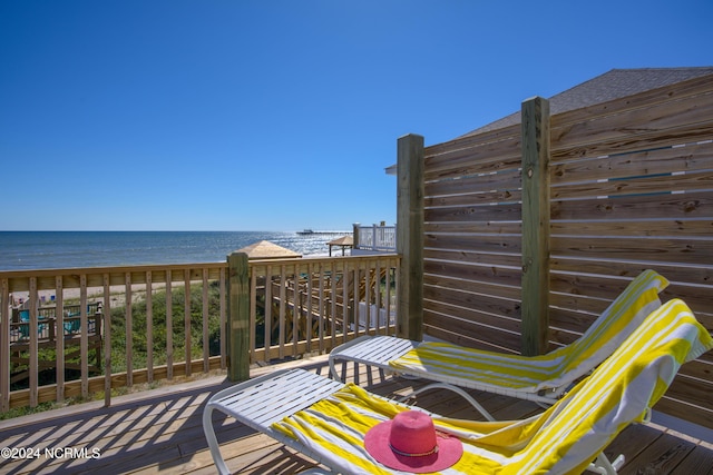 1016 New River Inlet Rd, North Topsail Beach, NC 28460 - wooden terrace with a water view