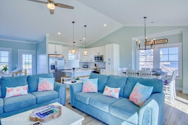 1016 New River Inlet Rd, North Topsail Beach, NC 28460 - living area featuring a wealth of natural light, light wood-style floors, and lofted ceiling