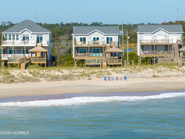 water view featuring a beach view