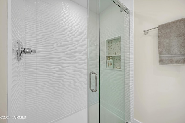 bathroom featuring walk in shower