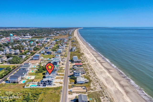 aerial view featuring a water view and a beach view