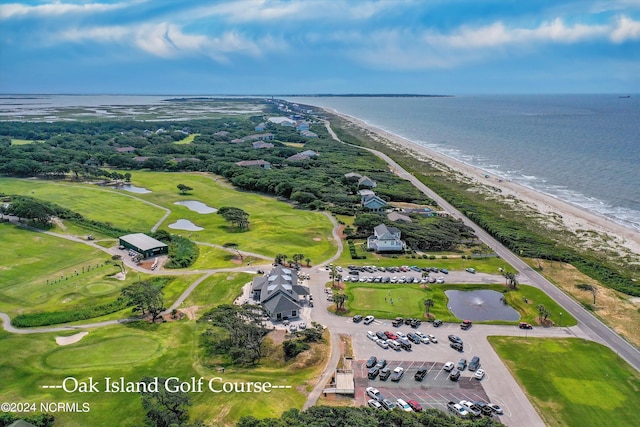 drone / aerial view with a water view and a view of the beach