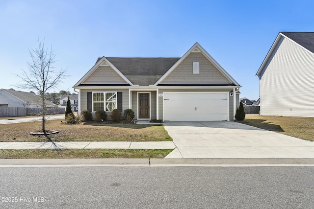 view of front of house with a garage and concrete driveway