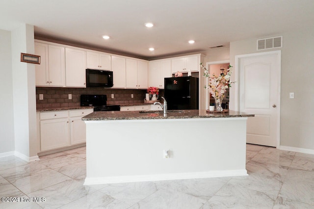 kitchen featuring white cabinetry, black appliances, sink, and a kitchen island with sink