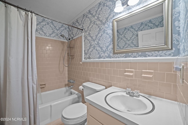 full bathroom with vanity, toilet, shower / bathtub combination with curtain, and tile walls