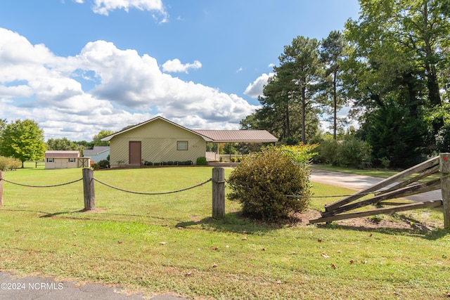 view of property exterior featuring a lawn