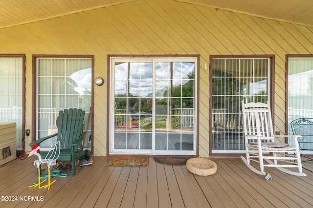 exterior space featuring a wooden deck