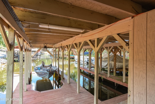 dock area featuring a water view