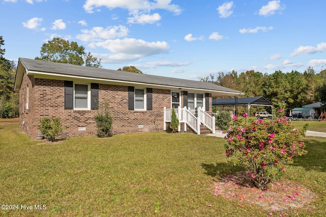 view of front facade with a front yard